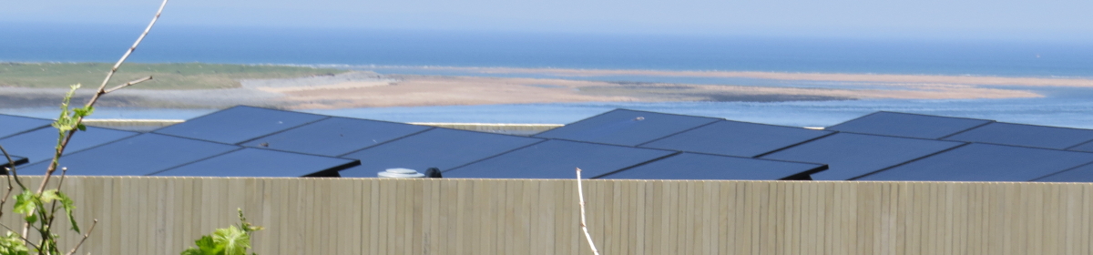 solar panels on modernist building with view