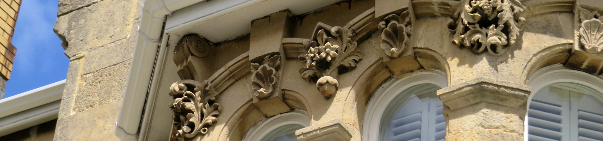 Victorian property with ornate window features