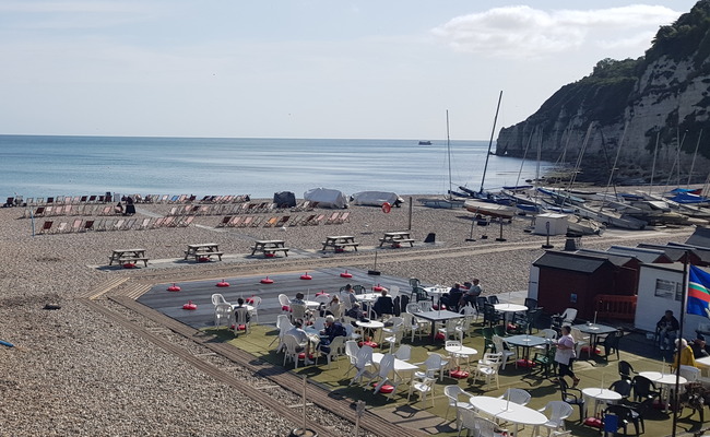 Cafe seating on the beach in Beer