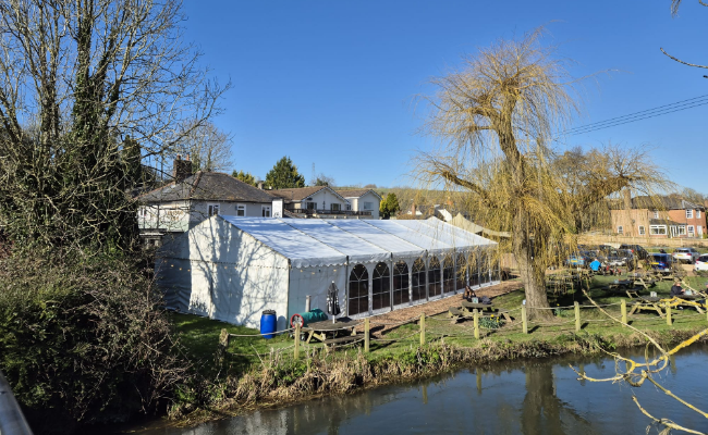 Marquee in the pub garden in Woodford